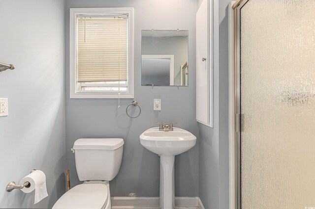 2479 Glen Dr, Little River, SC 29566 - bathroom featuring toilet and a sink