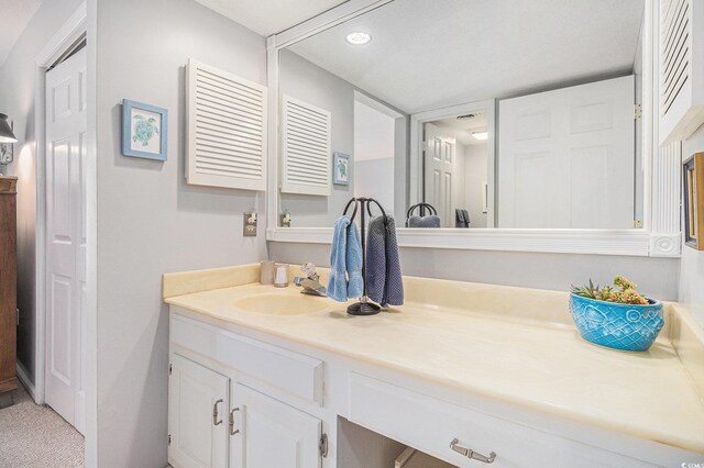 1801 N Ocean Blvd Unit Q-2, North Myrtle Beach, SC 29582 - bathroom with vanity and recessed lighting