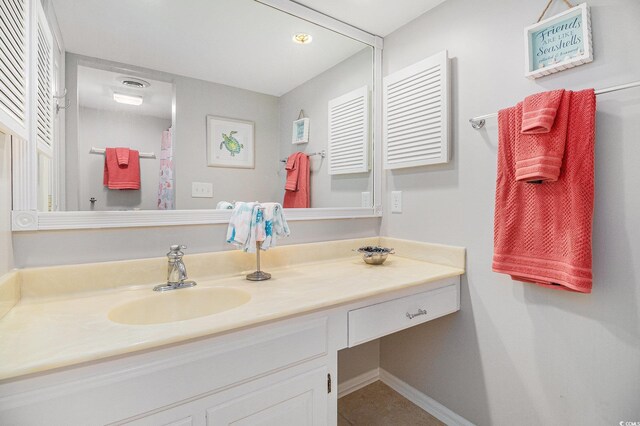 1801 N Ocean Blvd Unit Q-2, North Myrtle Beach, SC 29582 - full bath featuring vanity and baseboards