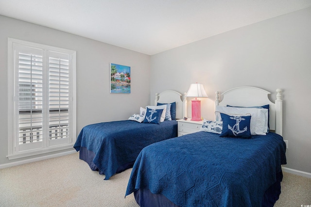 1801 N Ocean Blvd Unit Q-2, North Myrtle Beach, SC 29582 - carpeted bedroom featuring baseboards