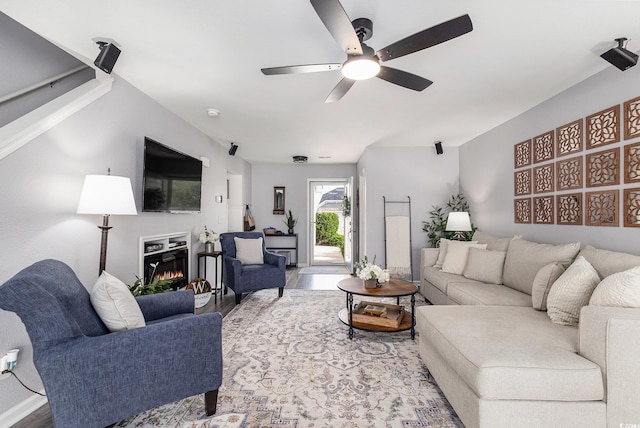 1209 Eagle Creek Dr, Myrtle Beach, SC 29588 - living area featuring a ceiling fan, wood finished floors, and a glass covered fireplace