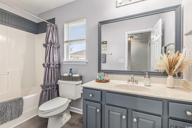1209 Eagle Creek Dr, Myrtle Beach, SC 29588 - full bath with toilet, vanity, wood finished floors, shower / bathtub combination with curtain, and baseboards