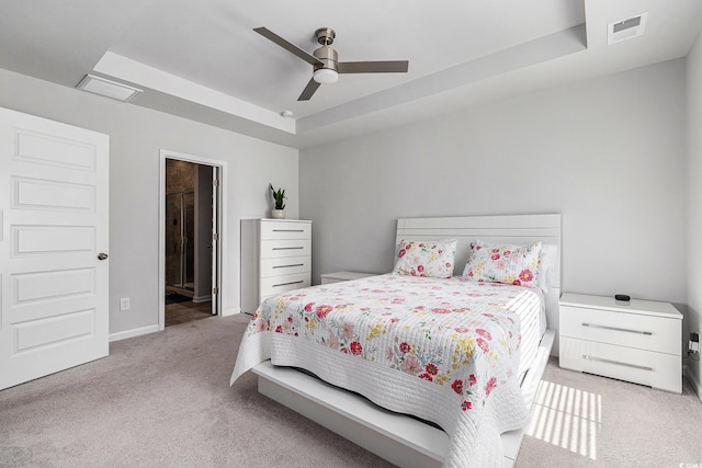 179 Empyrean Cir, Myrtle Beach, SC 29588 - carpeted bedroom featuring a tray ceiling, baseboards, and ceiling fan