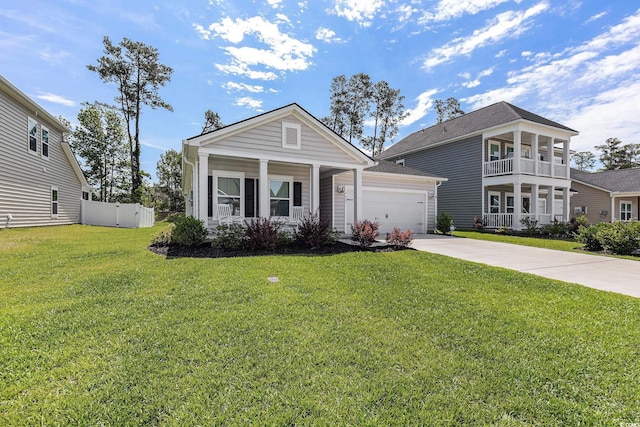 179 Empyrean Cir, Myrtle Beach, SC 29588 - view of front facade featuring concrete driveway, an attached garage, and a porch