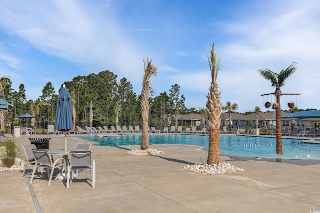 179 Empyrean Cir, Myrtle Beach, SC 29588 - community pool with a patio area