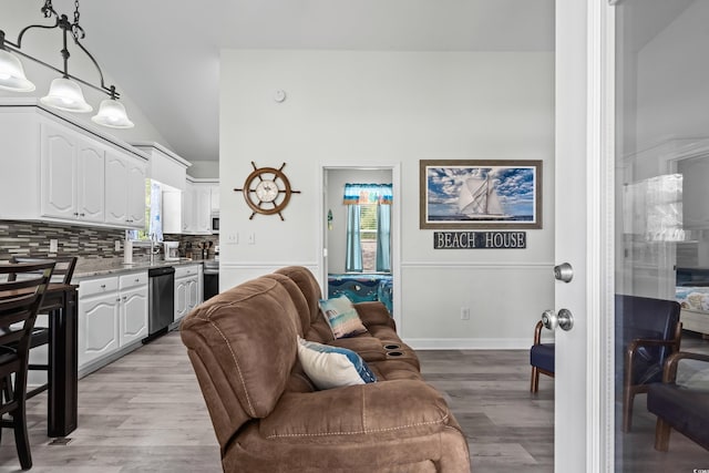 6001-1737 S Kings Hwy, Myrtle Beach, SC 29575 - living room with light wood-style flooring and lofted ceiling