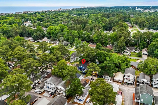 6001-1737 S Kings Hwy, Myrtle Beach, SC 29575 - aerial view of residential area with a nearby body of water and a tree filled landscape