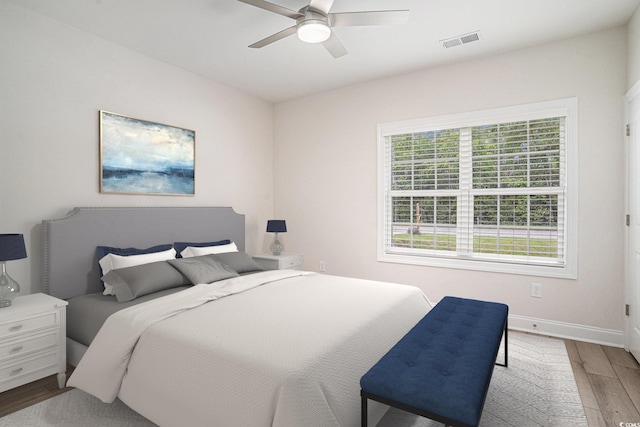 1476 Burriss Rd, Conway, SC 29526 - bedroom with wood finished floors, baseboards, and a ceiling fan