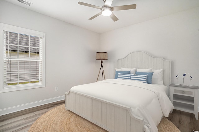 1476 Burriss Rd, Conway, SC 29526 - bedroom featuring wood finished floors, baseboards, and a ceiling fan