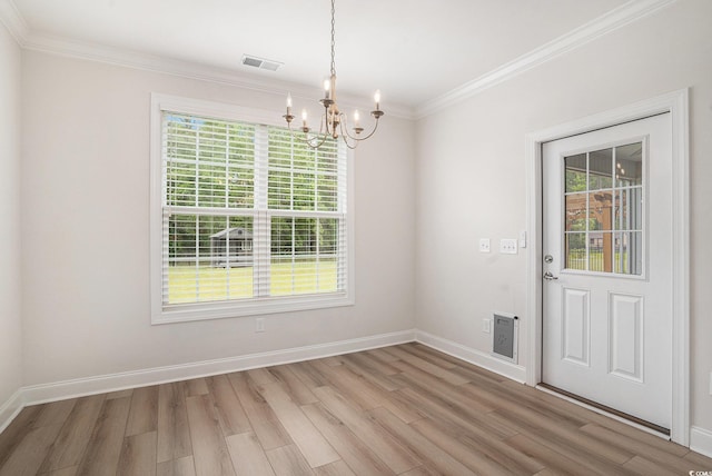 1476 Burriss Rd, Conway, SC 29526 - unfurnished dining area with a chandelier, light wood finished floors, crown molding, and baseboards