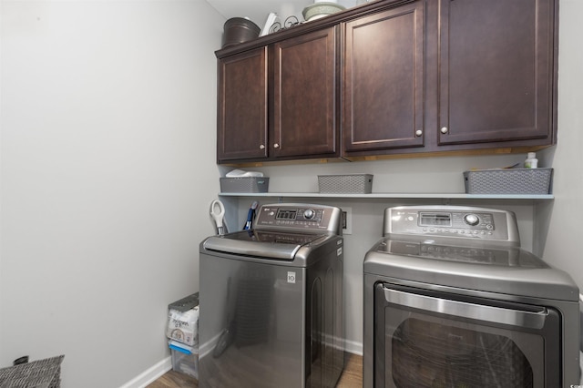 115 Machrie Loop Unit D, Myrtle Beach, SC 29588 - laundry area with independent washer and dryer, cabinet space, baseboards, and wood finished floors