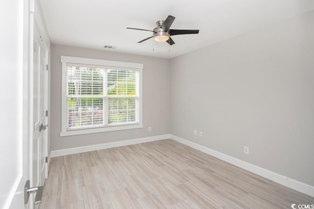 231 Marbella Dr, Murrells Inlet, SC 29576 - empty room with baseboards, a ceiling fan, and light wood-style flooring