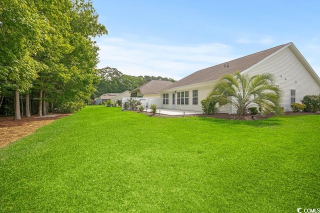 231 Marbella Dr, Murrells Inlet, SC 29576 - view of green lawn featuring a patio