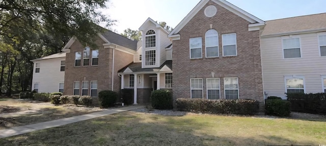 4319 Lotus Ct Unit A, Murrells Inlet, SC 29576 - traditional-style home featuring brick siding and a front yard