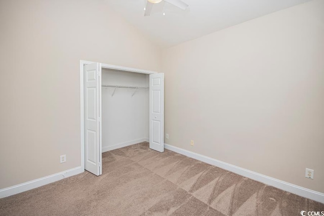 908 Wrigley Dr Unit 17-317-3G, Myrtle Beach, SC 29588 - unfurnished bedroom featuring light carpet, high vaulted ceiling, a closet, and a ceiling fan