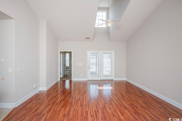 908 Wrigley Dr Unit 17-317-3G, Myrtle Beach, SC 29588 - unfurnished living room featuring high vaulted ceiling, a ceiling fan, and wood finished floors