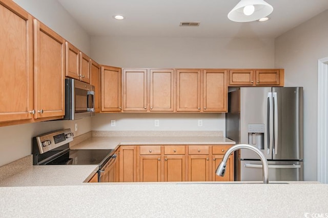 908 Wrigley Dr Unit 17-317-3G, Myrtle Beach, SC 29588 - kitchen featuring stainless steel appliances, light countertops, and recessed lighting
