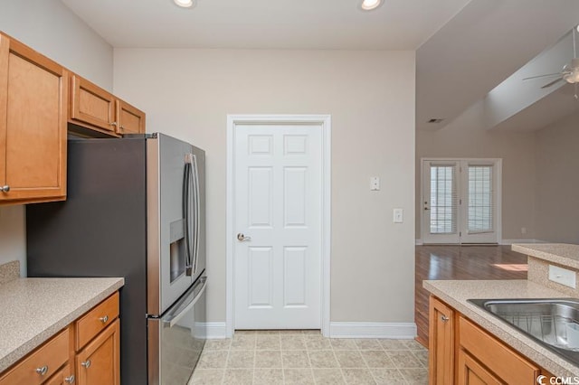 908 Wrigley Dr Unit 17-317-3G, Myrtle Beach, SC 29588 - kitchen with stainless steel refrigerator with ice dispenser, a ceiling fan, light countertops, brown cabinetry, and recessed lighting