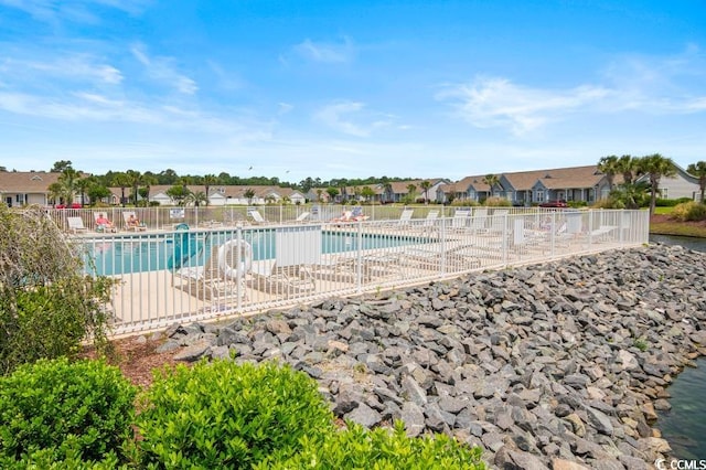 908 Wrigley Dr Unit 17-317-3G, Myrtle Beach, SC 29588 - community pool featuring a residential view and a patio