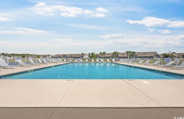 908 Wrigley Dr Unit 17-317-3G, Myrtle Beach, SC 29588 - community pool featuring a patio