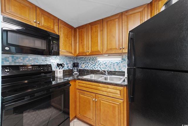 1501 Ocean Blvd S Unit 1249, Myrtle Beach, SC 29577 - kitchen with black appliances, a sink, light tile patterned flooring, and backsplash