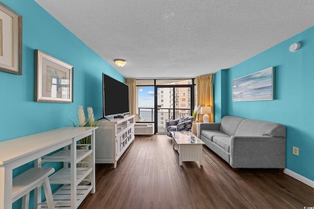 1501 Ocean Blvd S Unit 1249, Myrtle Beach, SC 29577 - living room featuring a textured ceiling, dark wood-type flooring, baseboards, and expansive windows