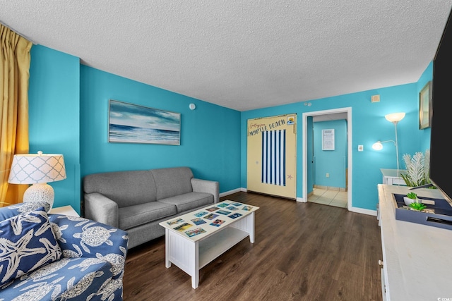 1501 Ocean Blvd S Unit 1249, Myrtle Beach, SC 29577 - living area with a textured ceiling, wood finished floors, and baseboards