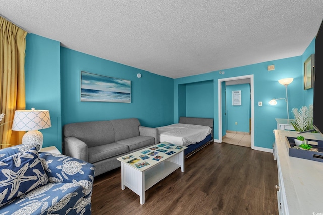 1501 Ocean Blvd S Unit 1249, Myrtle Beach, SC 29577 - living area featuring dark wood-style flooring, a textured ceiling, and baseboards