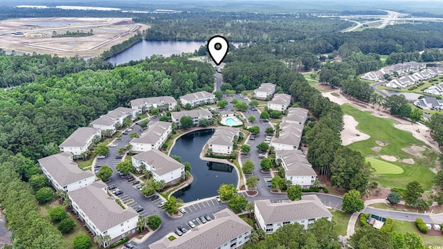 6253 Catalina Dr Unit 733, North Myrtle Beach, SC 29582 - aerial overview of property's location with a nearby body of water, nearby suburban area, a heavily wooded area, and a golf club