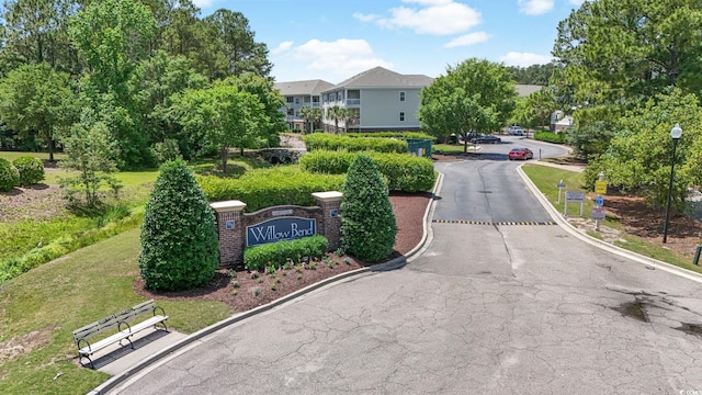 6253 Catalina Dr Unit 733, North Myrtle Beach, SC 29582 - view of asphalt road with street lighting, curbs, and a residential view