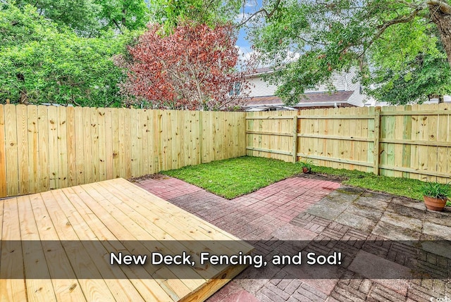633 Sparrow Dr Unit B, Surfside Beach, SC 29575 - deck featuring a fenced backyard and a patio area