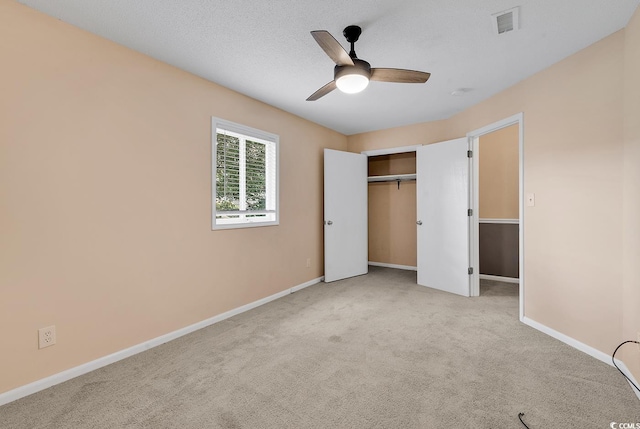633 Sparrow Dr Unit B, Surfside Beach, SC 29575 - unfurnished bedroom with carpet flooring, baseboards, a closet, and ceiling fan