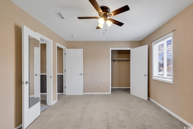 633 Sparrow Dr Unit B, Surfside Beach, SC 29575 - unfurnished bedroom with light carpet, a closet, baseboards, and a ceiling fan