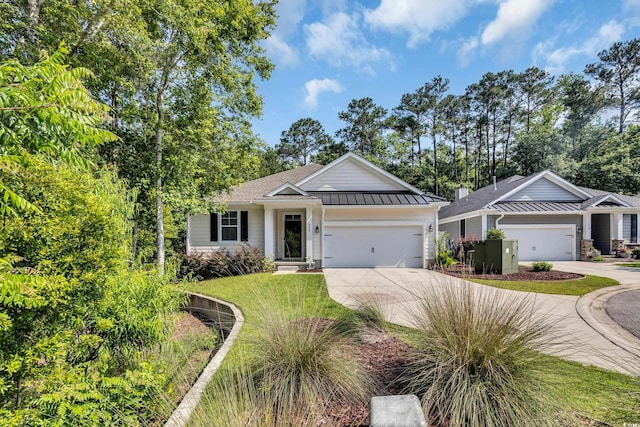 340 Scottsdale Ct, Murrells Inlet, SC 29576 - ranch-style home featuring a standing seam roof, concrete driveway, a garage, and metal roof