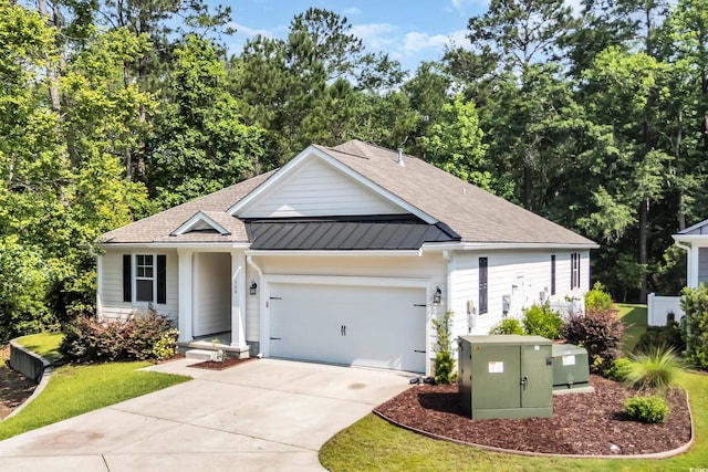 340 Scottsdale Ct, Murrells Inlet, SC 29576 - single story home with a shingled roof, an attached garage, driveway, and a standing seam roof