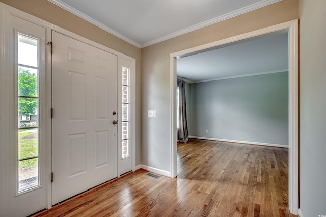 3334 Cedar Creek Run, Little River, SC 29566 - foyer featuring wood finished floors, plenty of natural light, baseboards, and ornamental molding