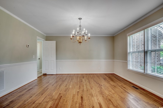 3334 Cedar Creek Run, Little River, SC 29566 - empty room featuring a chandelier, light wood-style floors, healthy amount of natural light, crown molding, and baseboards