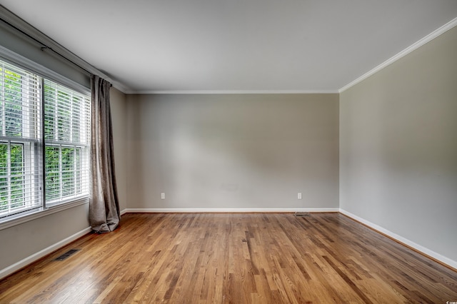 3334 Cedar Creek Run, Little River, SC 29566 - empty room featuring crown molding, wood finished floors, and baseboards