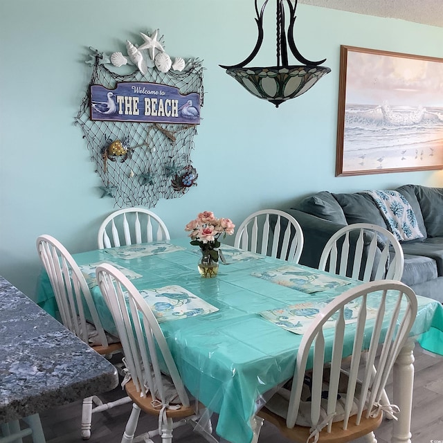 523 S Ocean Blvd Unit 705, North Myrtle Beach, SC 29582 - dining room with wood finished floors