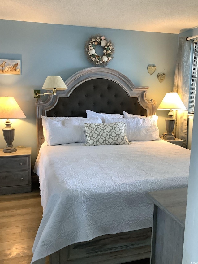 523 S Ocean Blvd Unit 705, North Myrtle Beach, SC 29582 - bedroom with wood finished floors