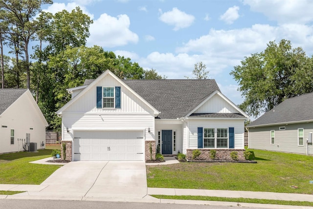 2609 Seaport Cir, Georgetown, SC 29440 - modern farmhouse featuring brick siding, concrete driveway, central AC unit, board and batten siding, and a front yard