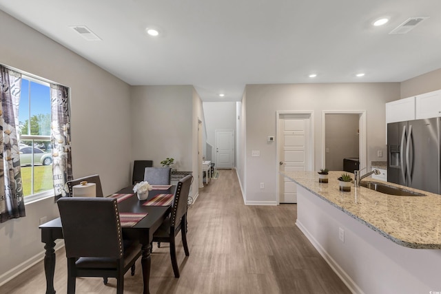 120 Carolina Lakes Blvd, Myrtle Beach, SC 29588 - dining room featuring recessed lighting, light wood-style flooring, and baseboards