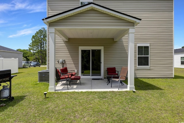120 Carolina Lakes Blvd, Myrtle Beach, SC 29588 - rear view of house featuring a patio area, a yard, and central AC