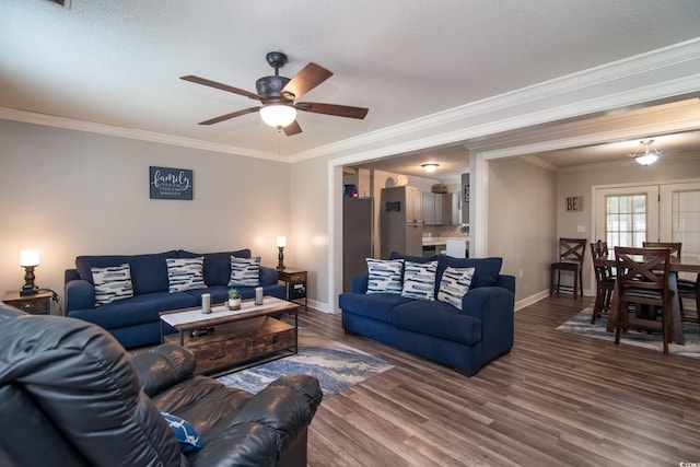 2510 Redwood St, Georgetown, SC 29440 - living room featuring ceiling fan, baseboards, crown molding, and wood finished floors