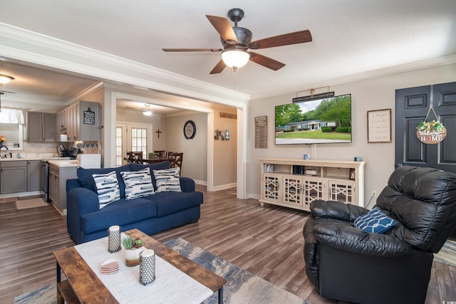 2510 Redwood St, Georgetown, SC 29440 - living area featuring ornamental molding, a ceiling fan, wood finished floors, and baseboards