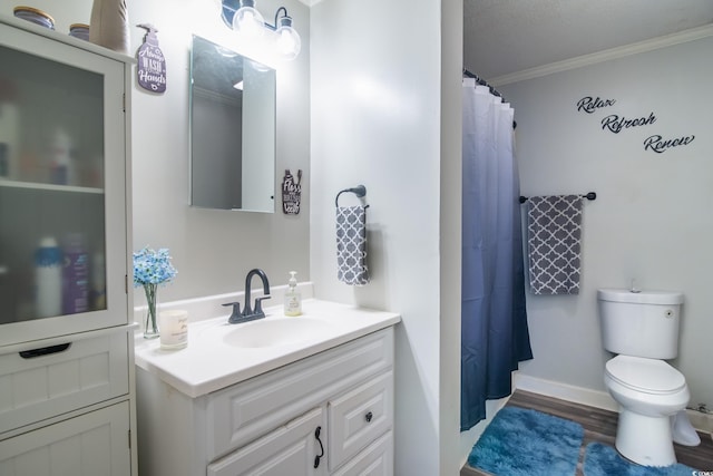 2510 Redwood St, Georgetown, SC 29440 - bathroom featuring vanity, crown molding, toilet, wood finished floors, and a shower with curtain