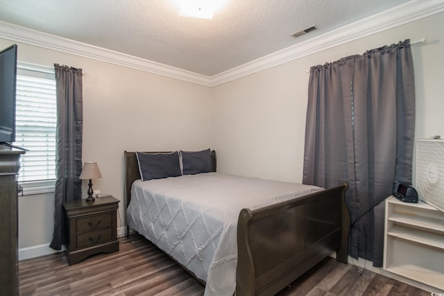 2510 Redwood St, Georgetown, SC 29440 - bedroom with wood finished floors, crown molding, and a textured ceiling