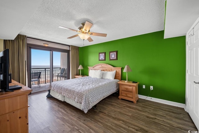 4103 N Ocean Blvd N Unit 204, North Myrtle Beach, SC 29582 - bedroom featuring access to exterior, a textured ceiling, dark wood-style floors, baseboards, and a ceiling fan