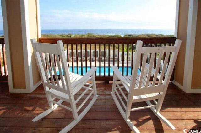4103 N Ocean Blvd N Unit 204, North Myrtle Beach, SC 29582 - balcony featuring view of pool and a water view