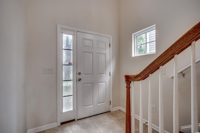 422 S Poplar Dr, Surfside Beach, SC 29575 - foyer entrance featuring light tile patterned floors and baseboards
